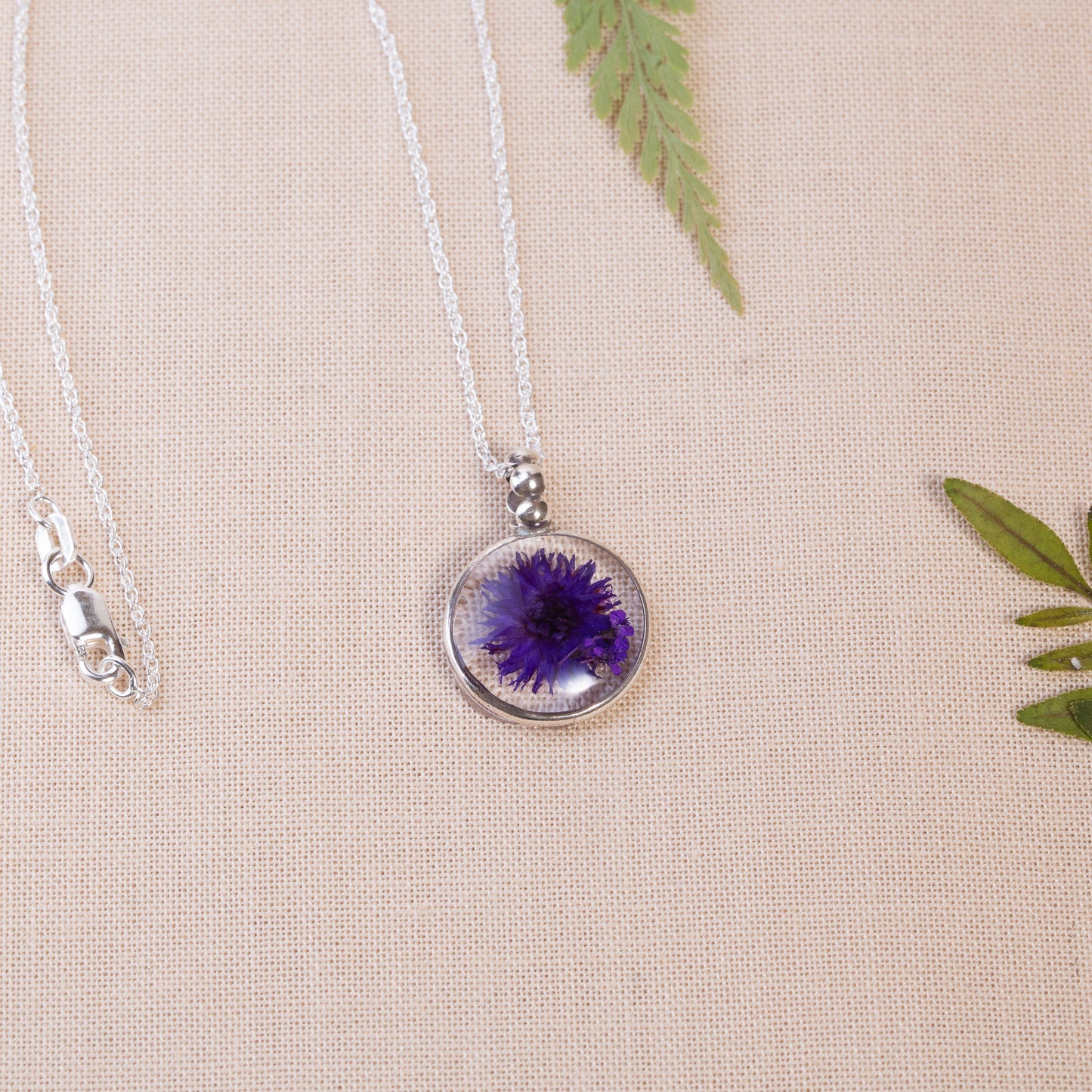 Sterling Silver Necklace Featuring Pressed Flowers